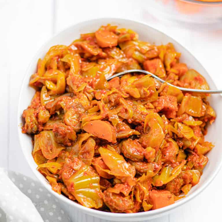 African Fried Cabbage Recipe on a white plate