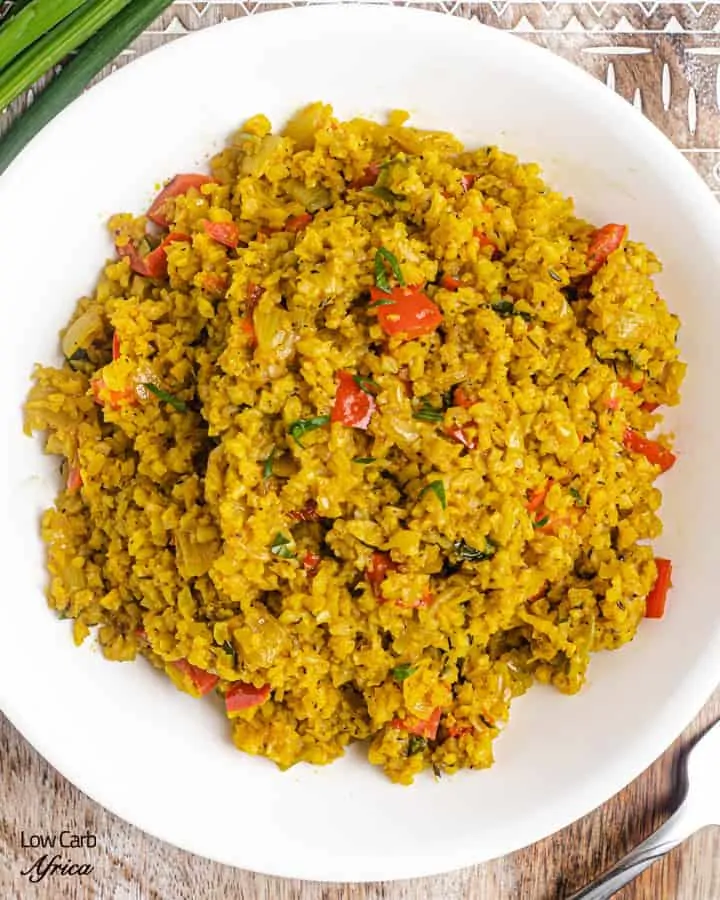 cauliflower rice made with scallions and red bell peppers