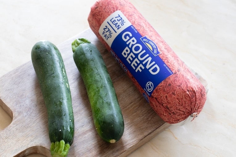 Zucchini and Ground Beef Stir Fry ingredients including fresh zucchini.