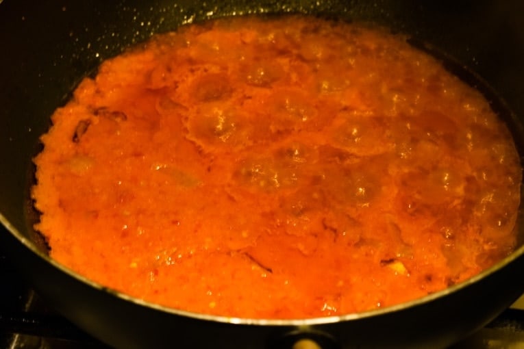 Efo riro, fry the blended tomatoes and pepper