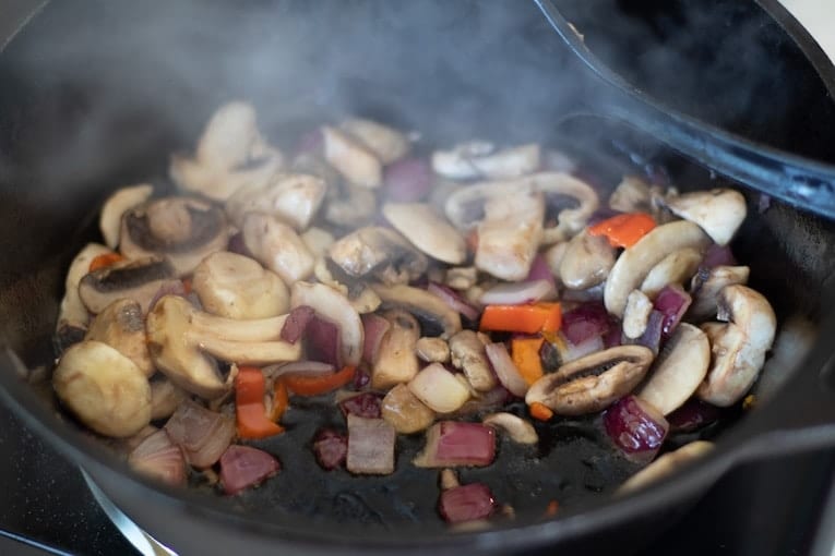 frying mushrooms and onions for green beans and mushrooms