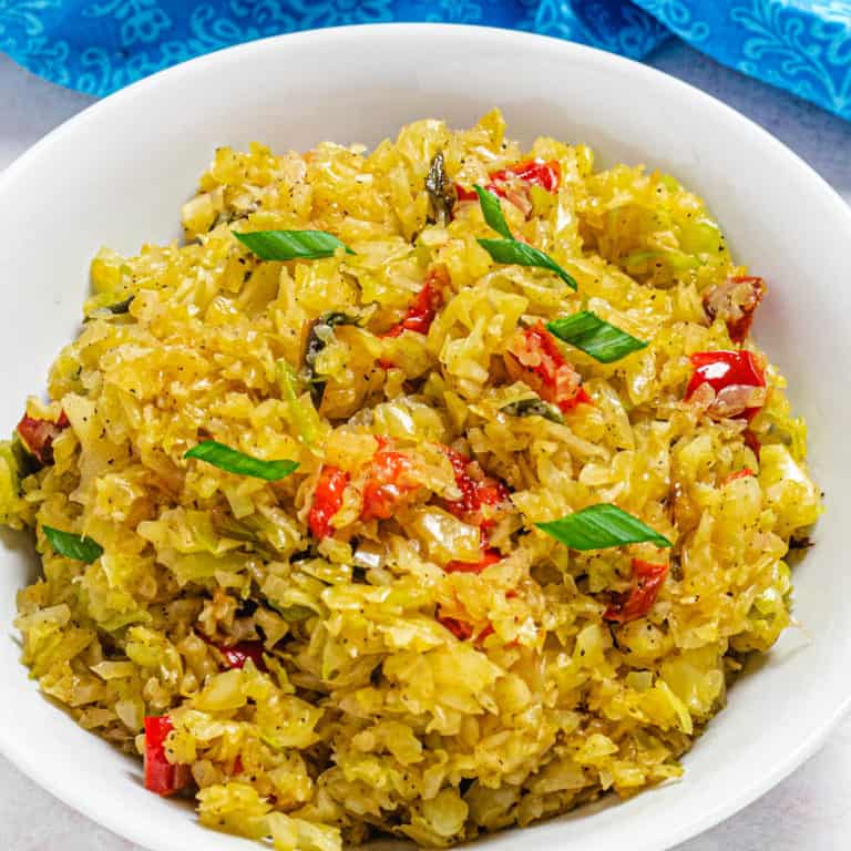 low carb cabbage rice in a white plate