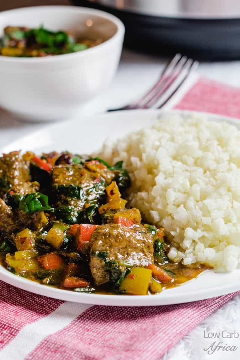 cauliflower and lamb curry served