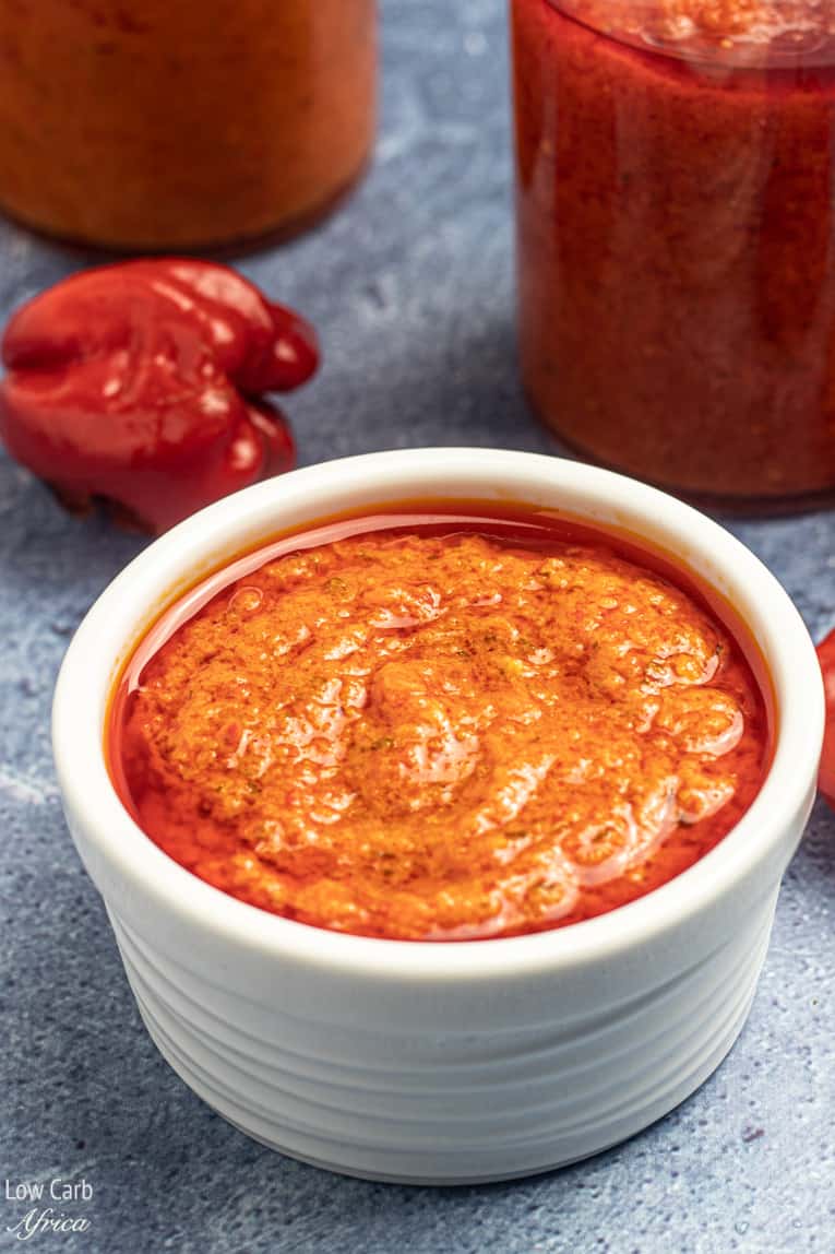 image of pepper sauce with habanero peppers