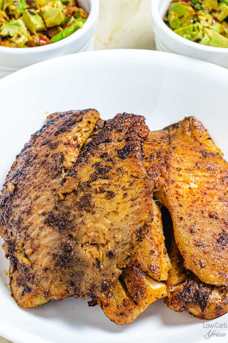 pan seared tilapia on a plate ready to eat