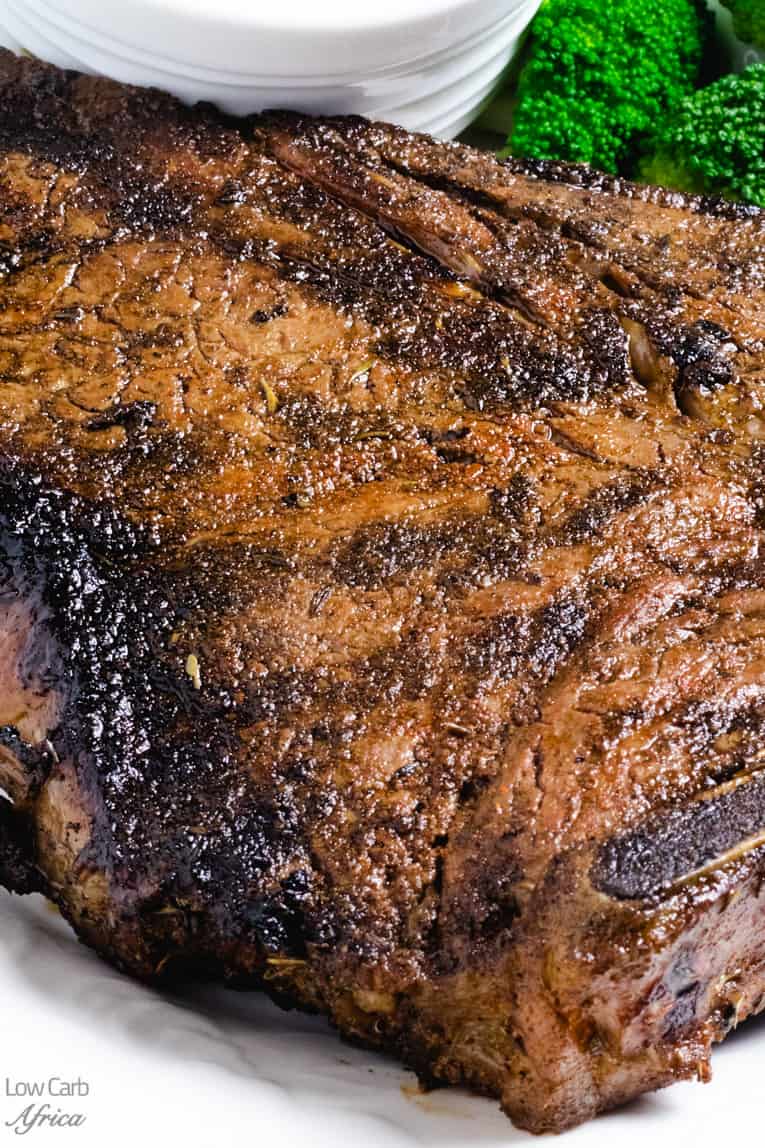 closeup image of grilled t-bone steak.