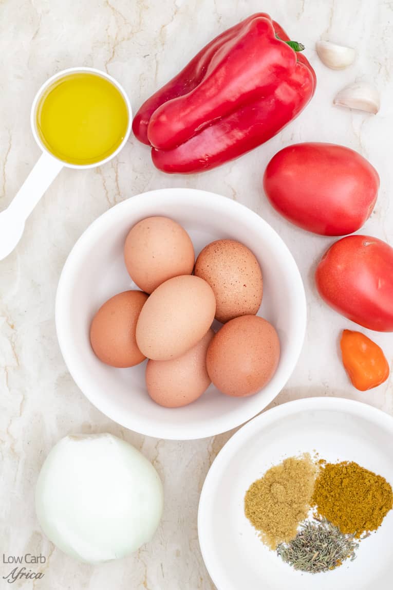 picture of eggs with tomatoes and peppers