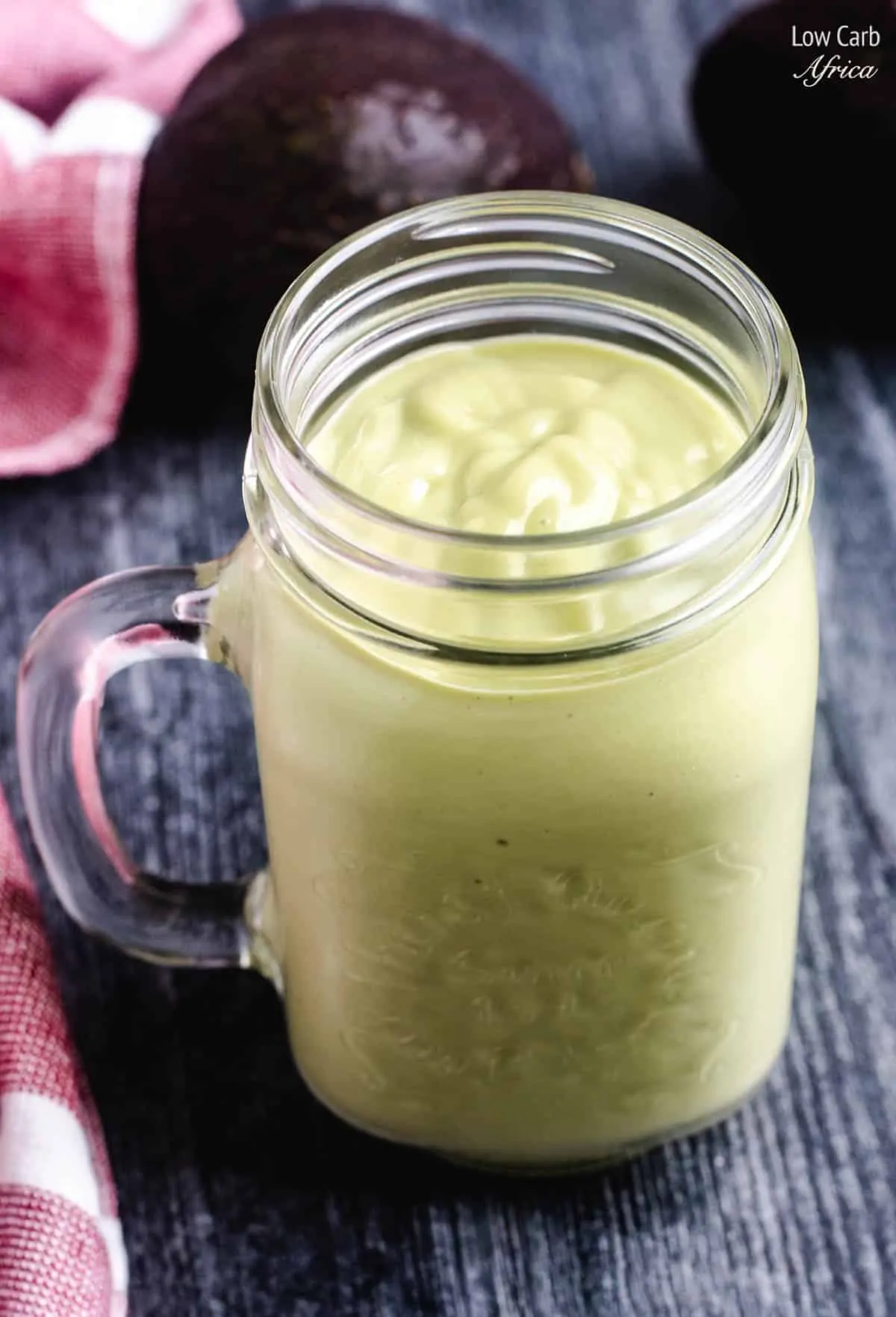 Keto Avocado Smoothie in a glass jar.