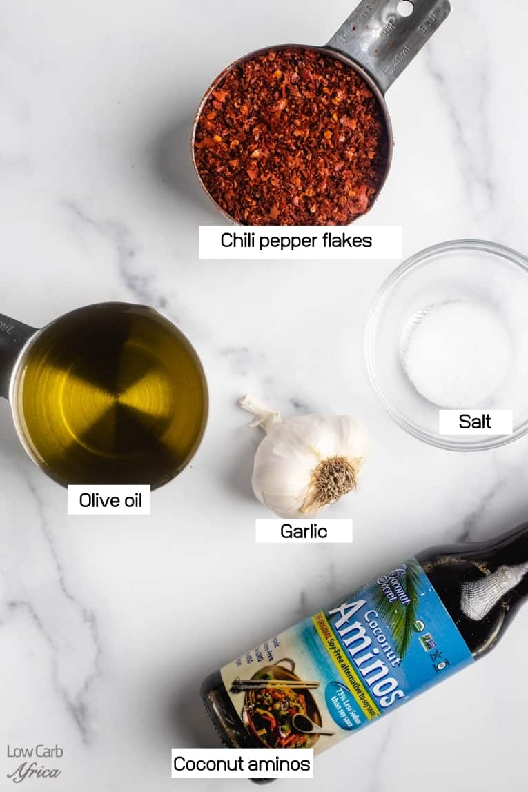 image of olive oil, chili pepper flakes, garlic