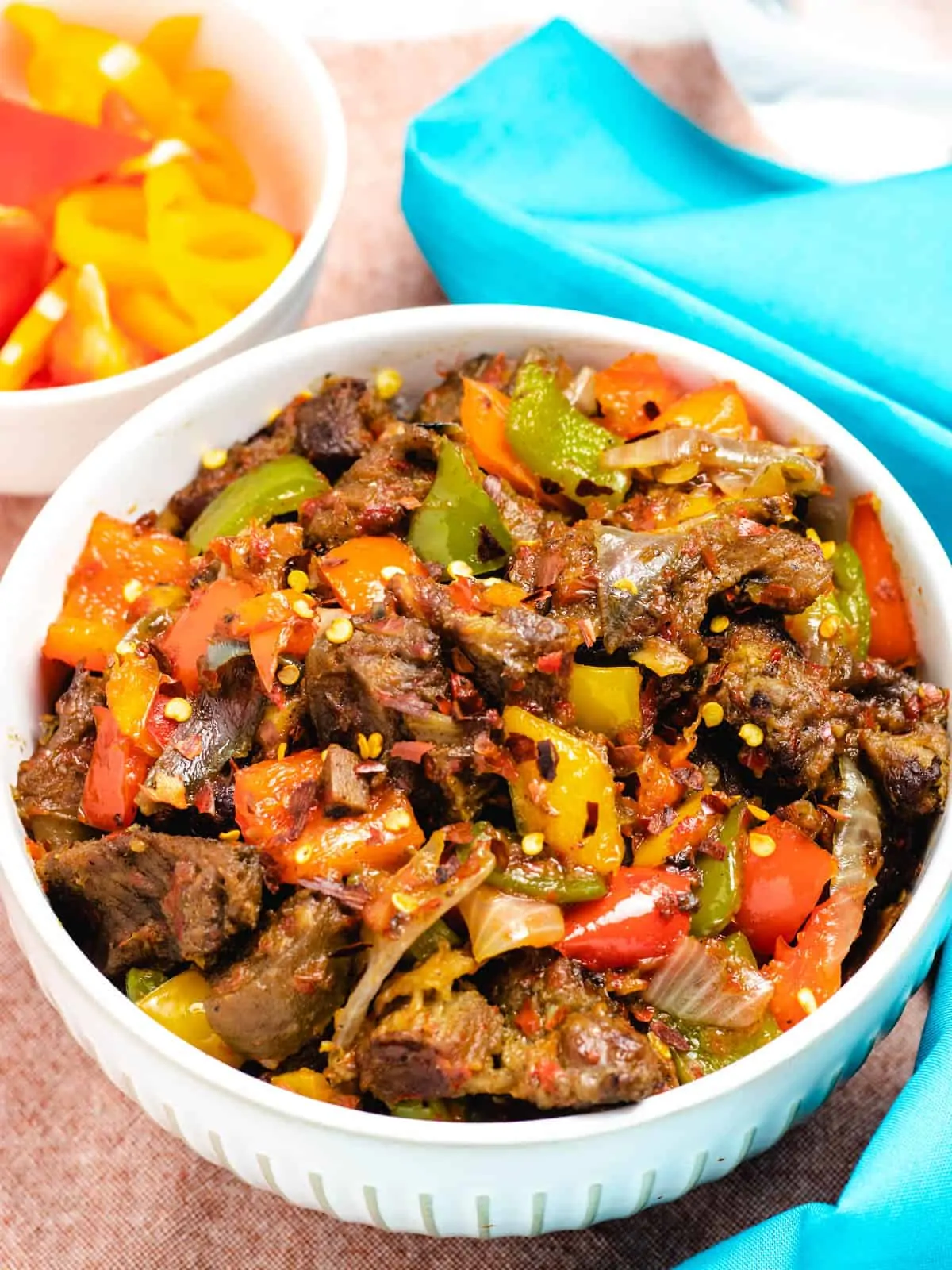 peppered goat meat with red and green bell peppers