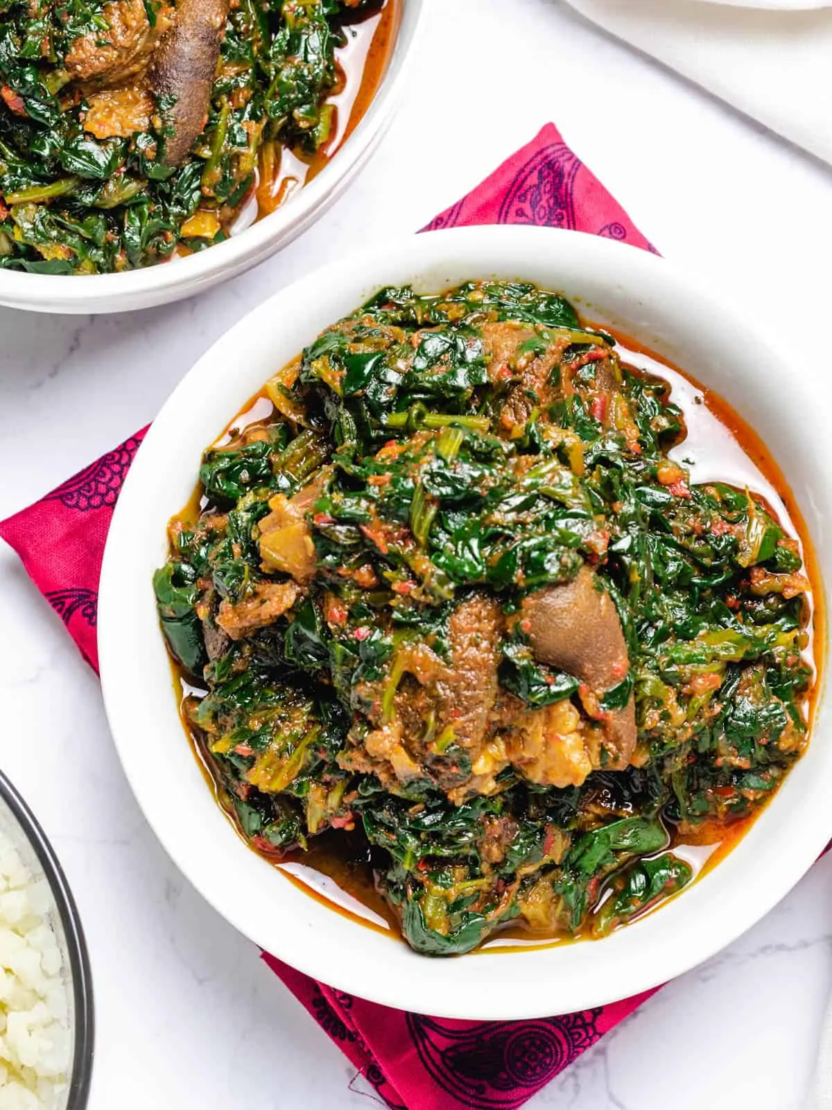 nigerian spinach stew in a white bowl
