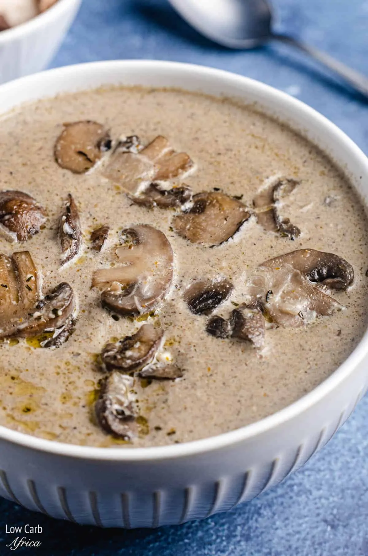 keto mushroom soup with extra mushrooms on top