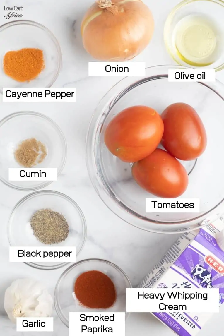 ingredient list of tomatoes, heavy whipping cream and spices