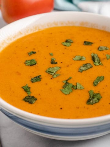 easy keto tomato soup in a white bowl