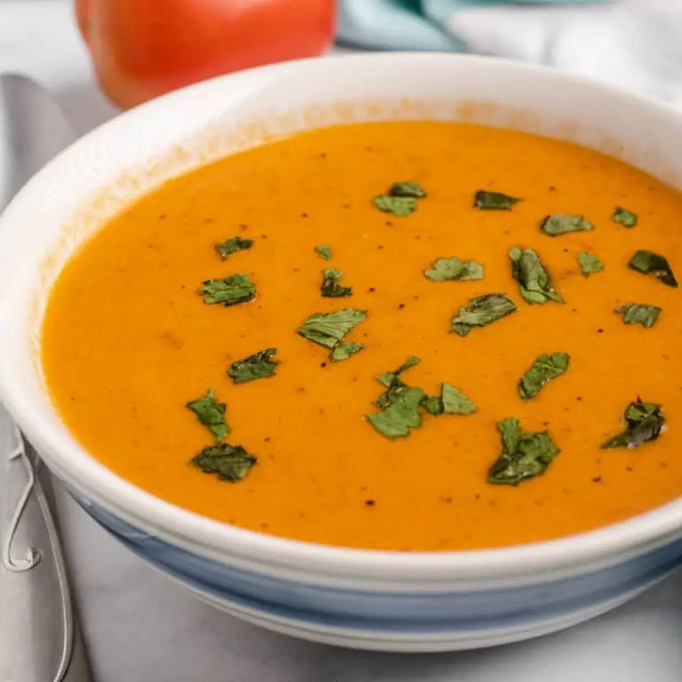 easy keto tomato soup in a white bowl