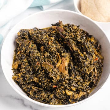 Nigerian egusi and bitterleaf soup with fufu on the side