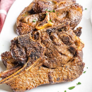 air fryer lamb chops on white plate