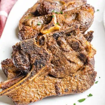 air fryer lamb chops on a white plate