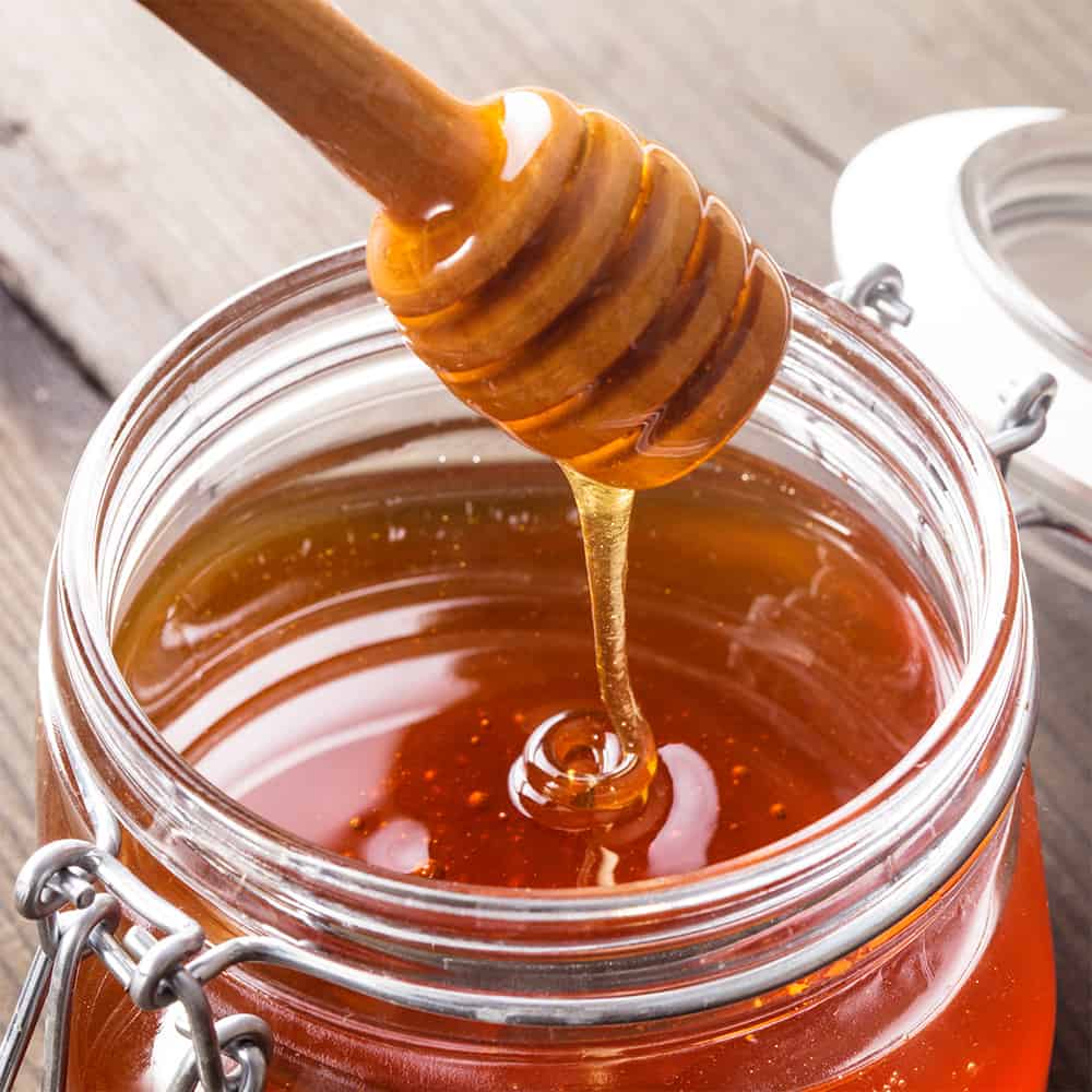 honey with honey dipper