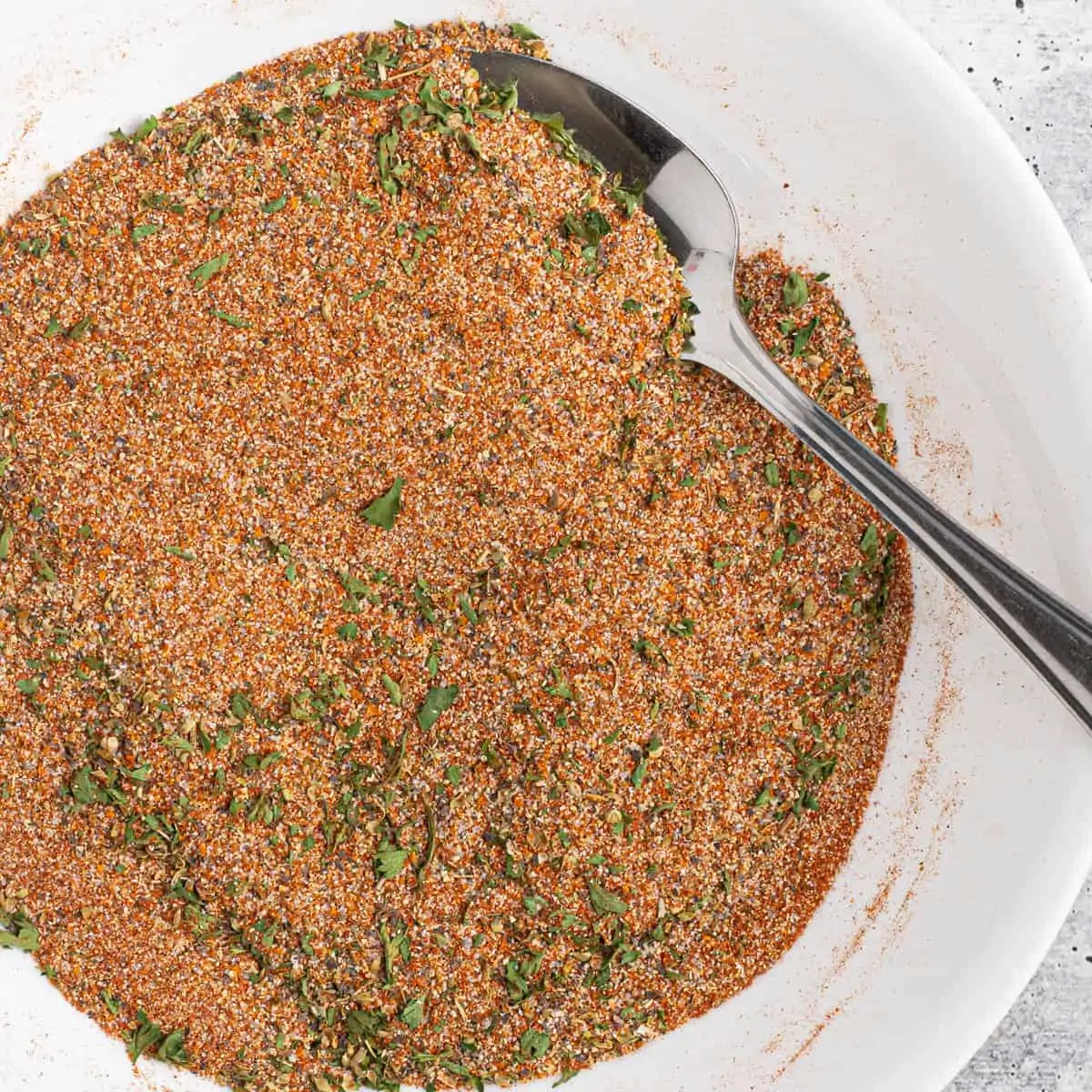 chicken spice mix in a white bowl.