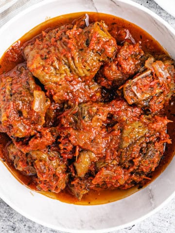 leftover turkey stew on a white plate