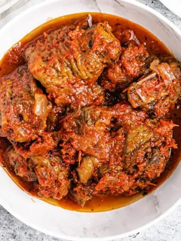 leftover turkey stew on a white plate