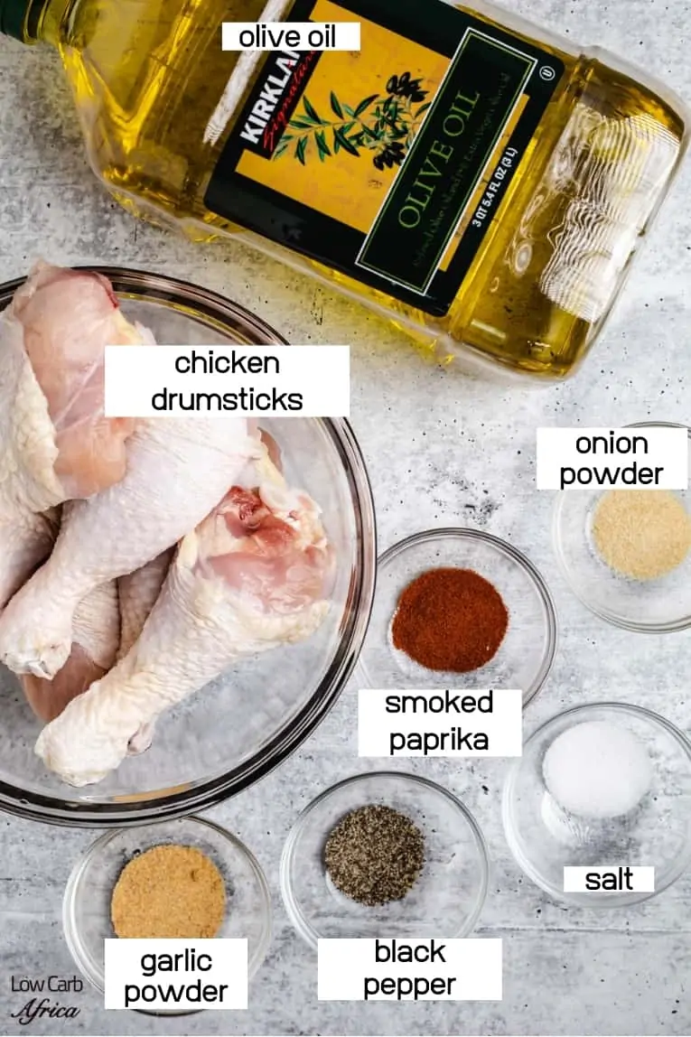 raw chicken drumsticks and spices