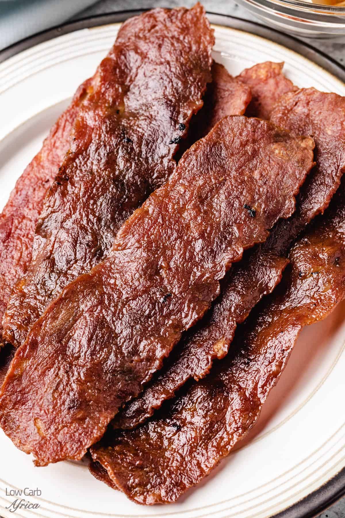 air fryer turkey bacon on a white plate