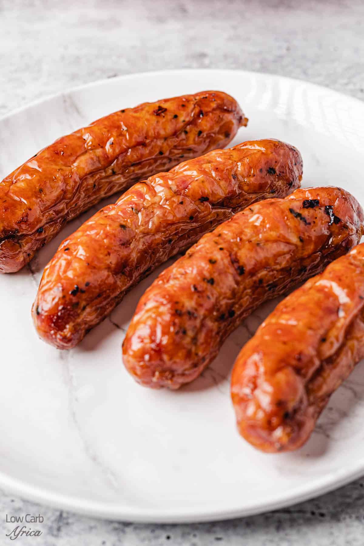 Air Fryer Breakfast Sausage Links on a white plate