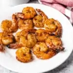 air fryer shrimps on a white plate