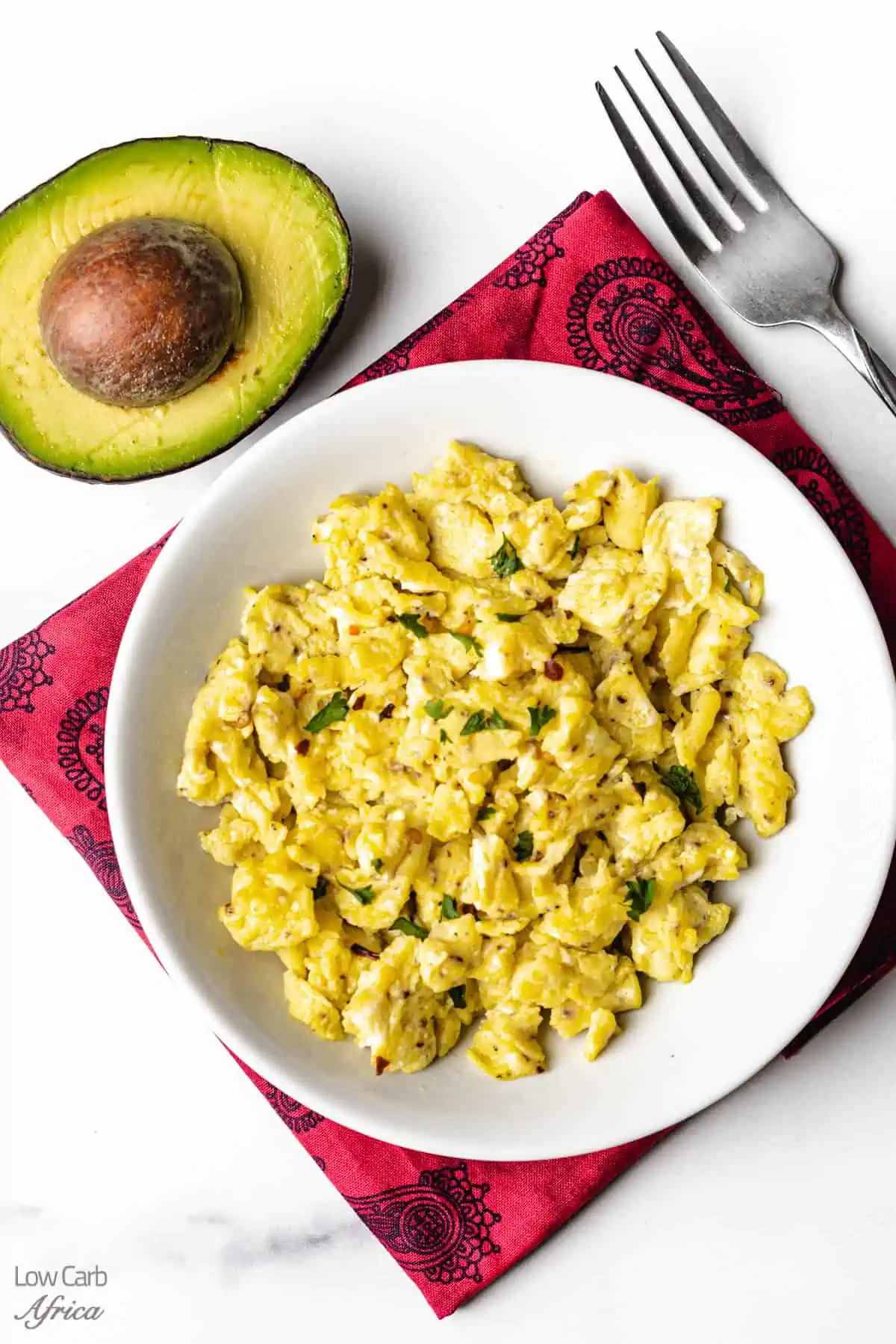 keto scrambled eggs with side of avocado