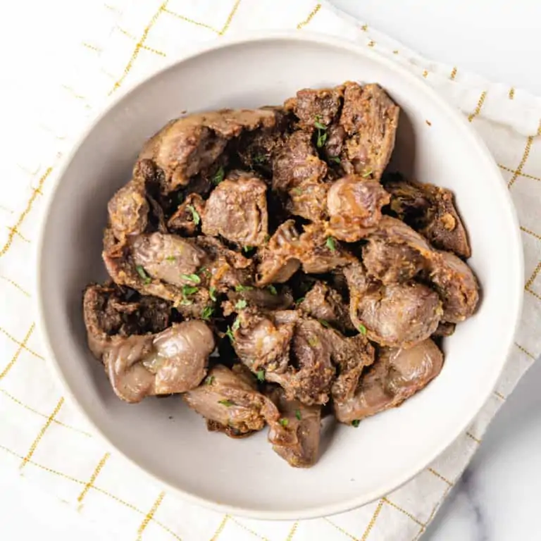 air fryer chicken gizzard on a white plate.