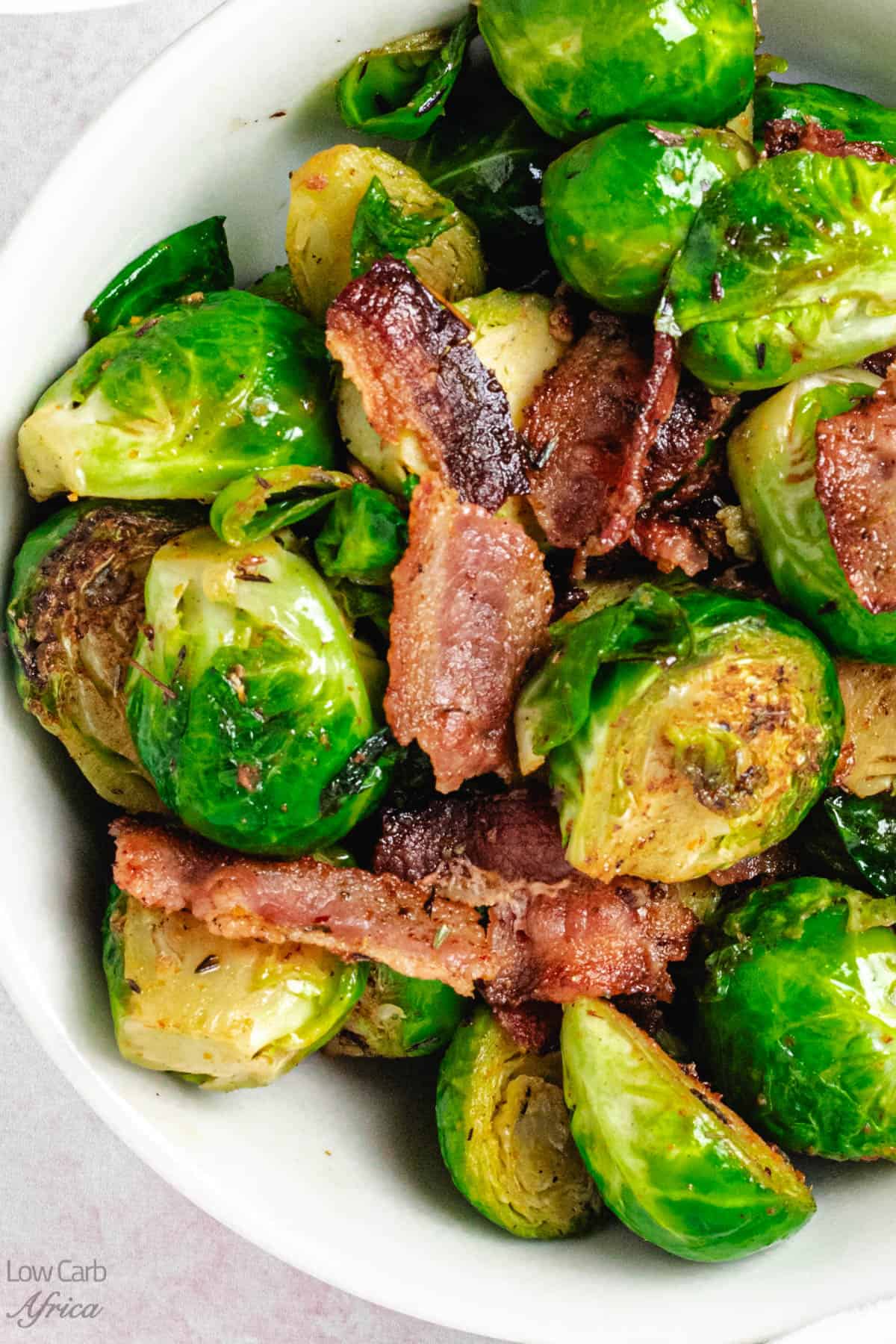 close up shot of fried brussels sprouts bacon