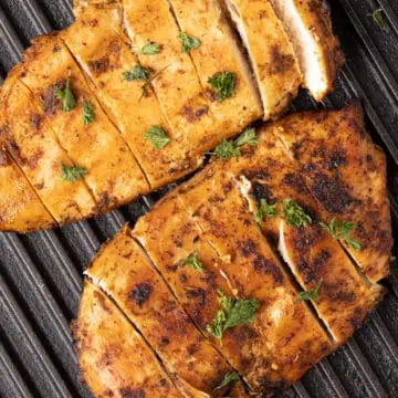 Juicy chicken breast on the grill