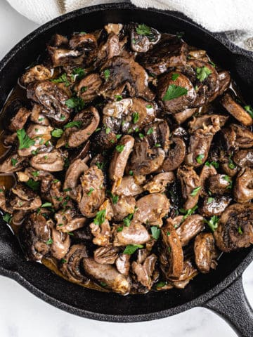 chicken hearts in a skillet