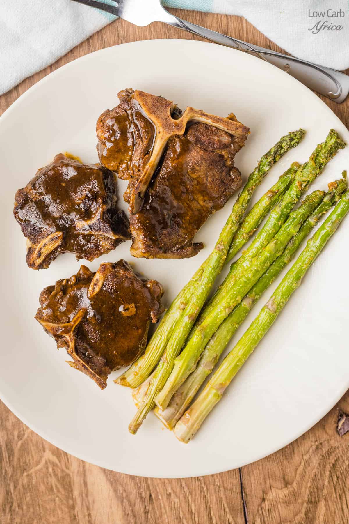 Instant Pot lamb chops on white plate