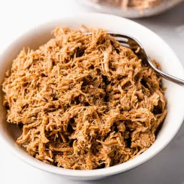 Instant Pot Pulled Pork in a white bowl