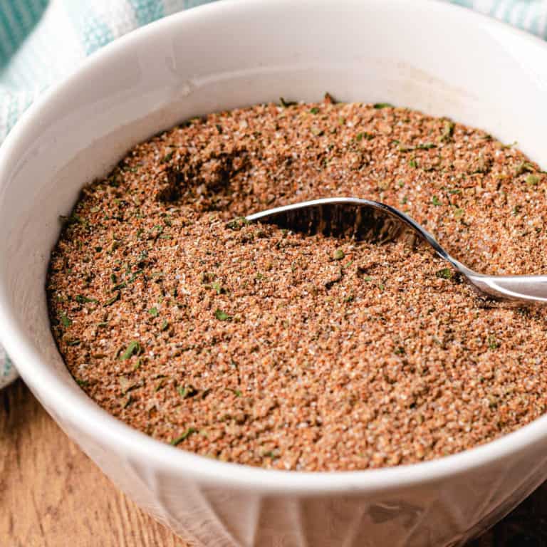 all purpose seasoning in a white bowl