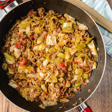 cabbage and ground beef in a skillet