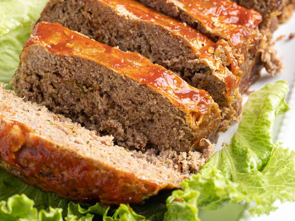 homemade keto meatloaf on lettuce.