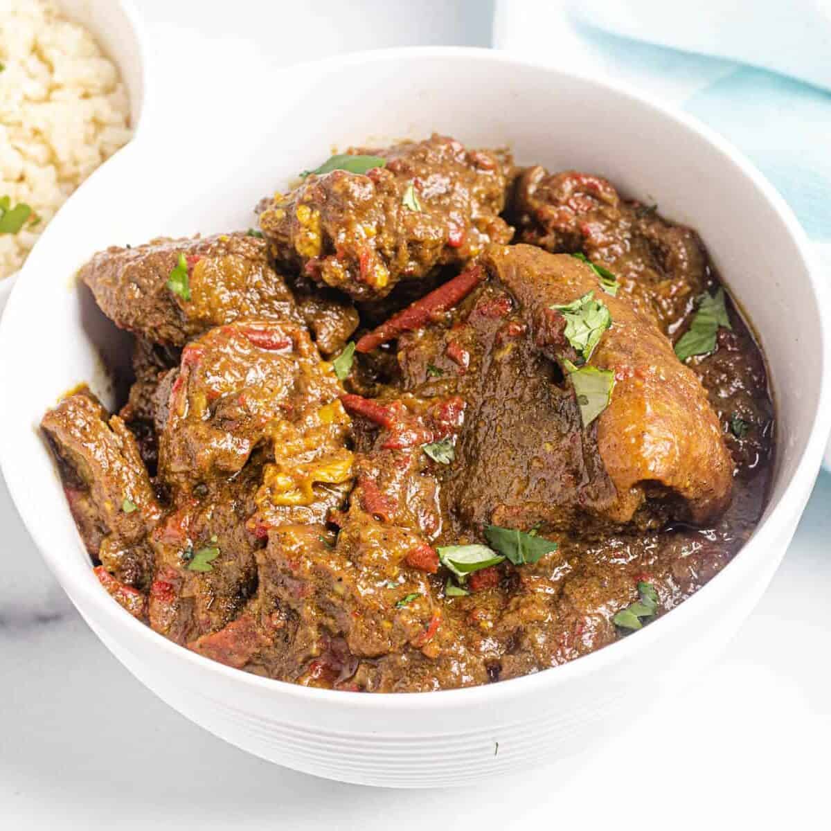 goat curry with a side of cauliflower rice
