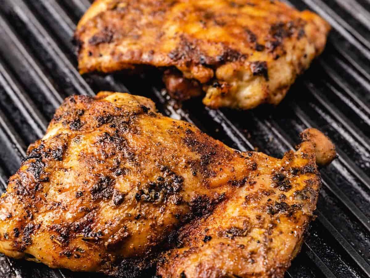 boneless chicken thighs on a grill