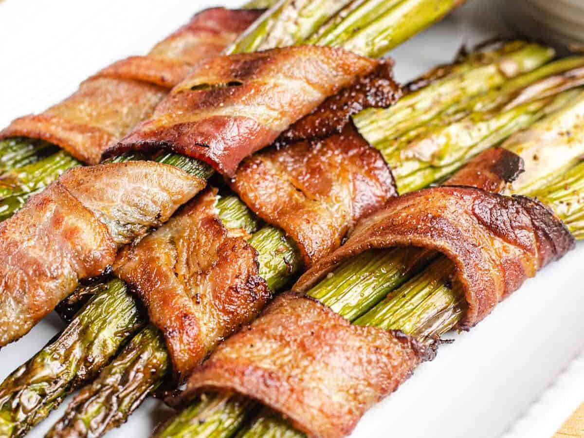 asparagus wrapped in bacon cooked in the air fryer.
