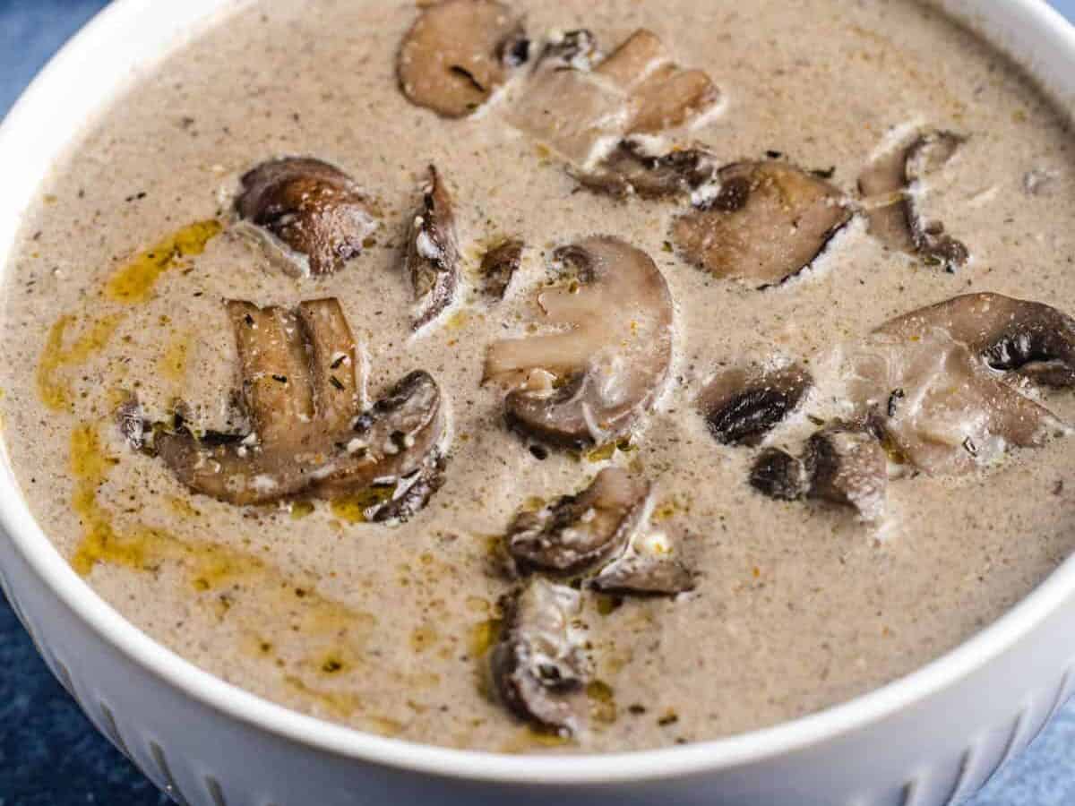white bowl of keto mushroom soup.