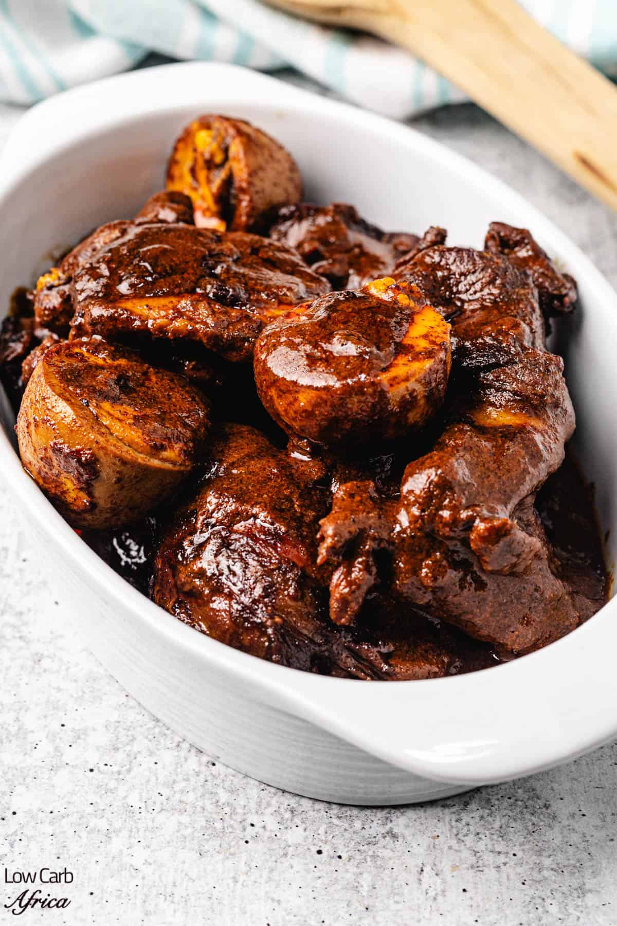 doro wat in a white bowl