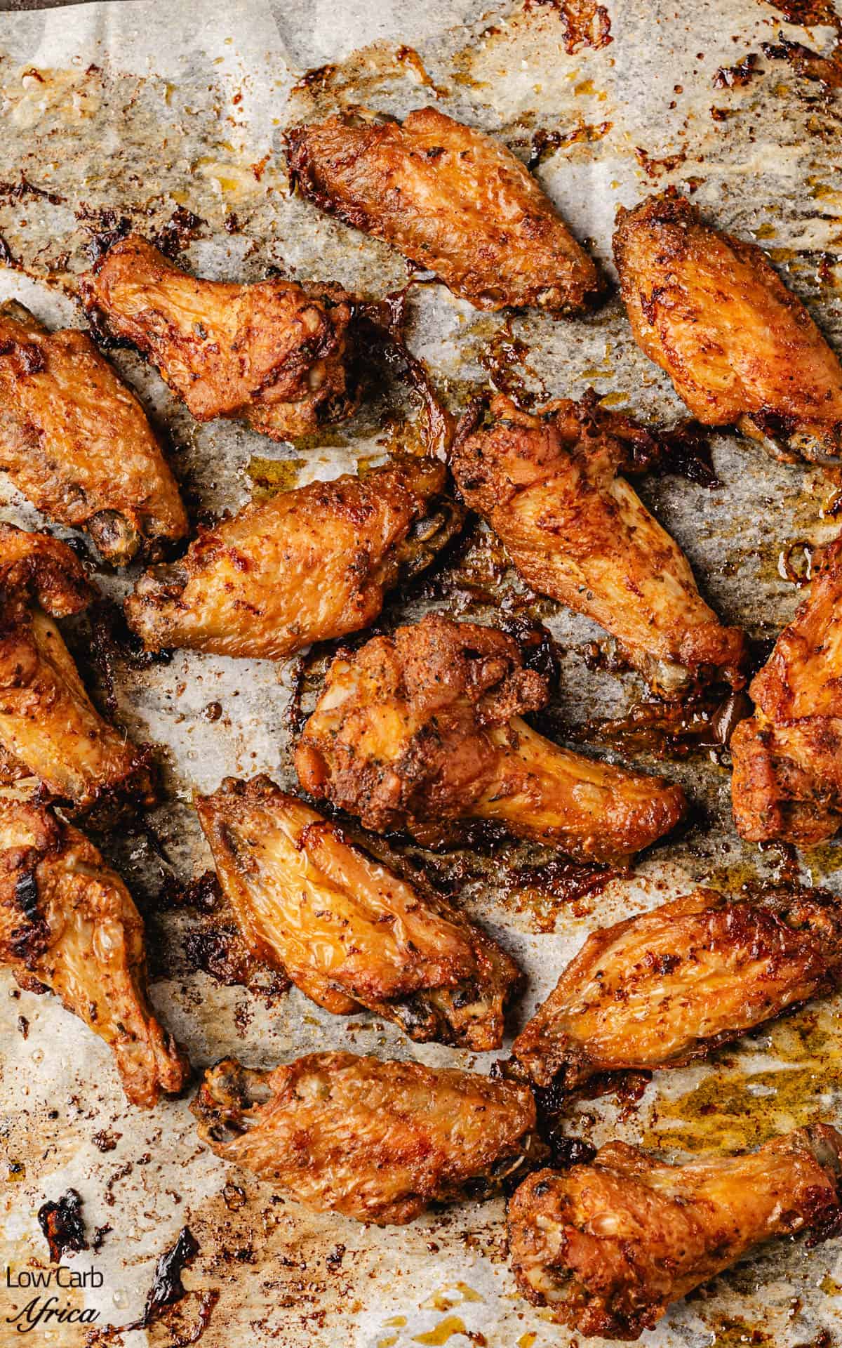 oven fried chicken wings on a baking tray