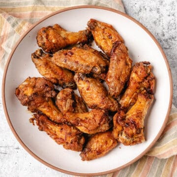 oven fried chicken wings on a white plate