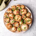 Stuffed Mushrooms with cheese in a plate