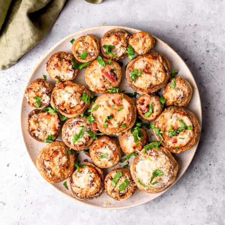 Stuffed Mushrooms with cheese in a plate