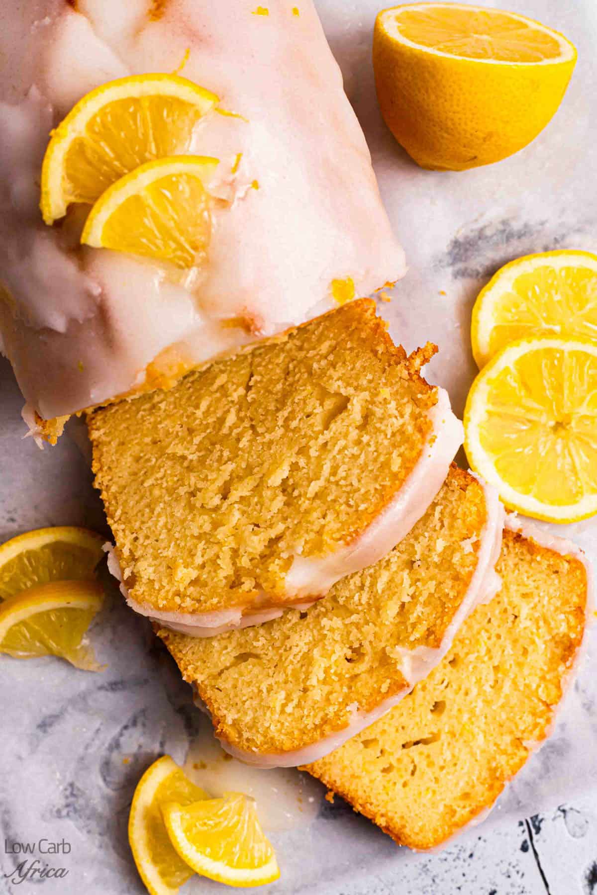 Freshly baked keto lemon cake with lemon garnish